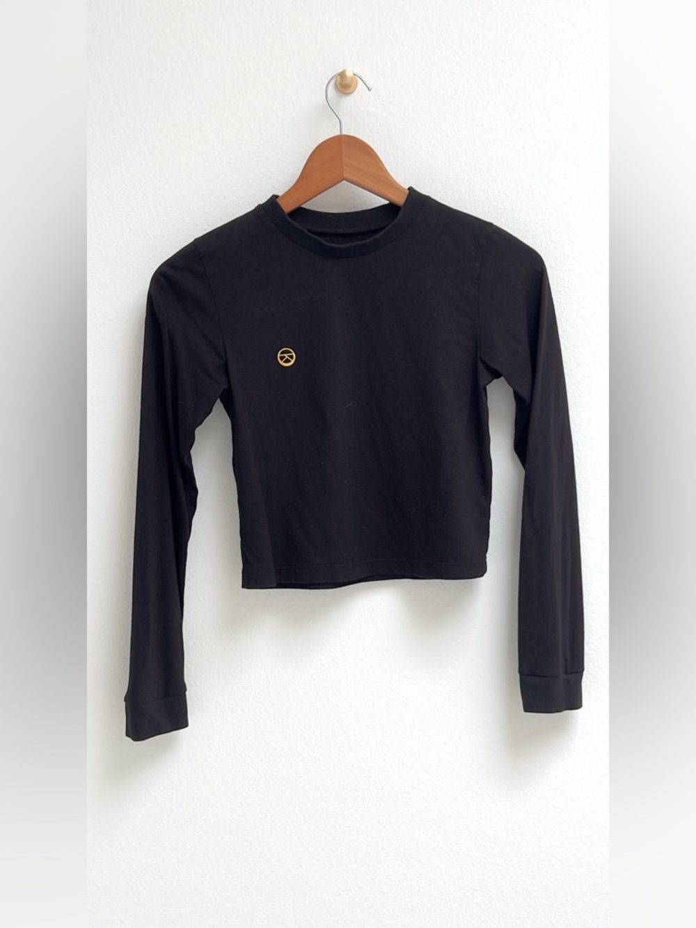 Studio K Bamboo Black LS Cropped Tee with Small Logo Gold Emblem, Small